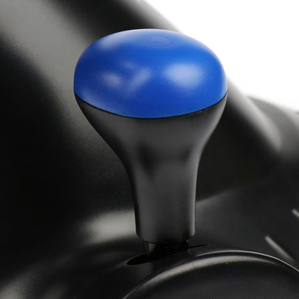 Close-up of a black gear shift with a blue knob on a blurred background