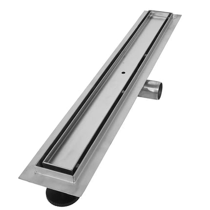 Stainless steel floor drain on a white background