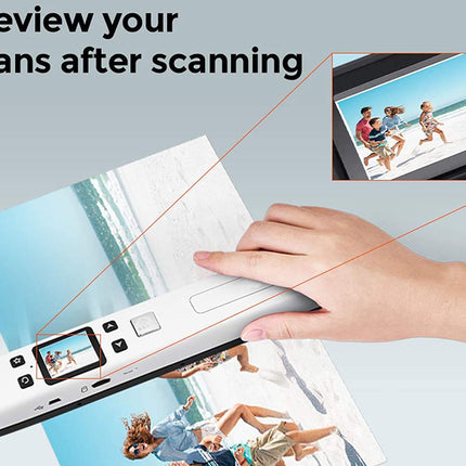 Hand holding a document scanner with images of people on a beach displayed on a screen.