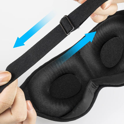 Black sleep mask with adjustable strap on a white background