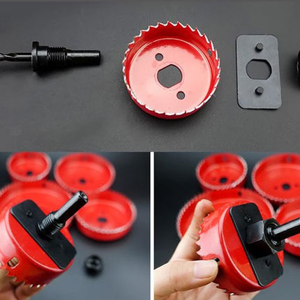Set of red and black drill bits and accessories on a dark background