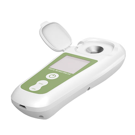 White and green electronic device on a white background