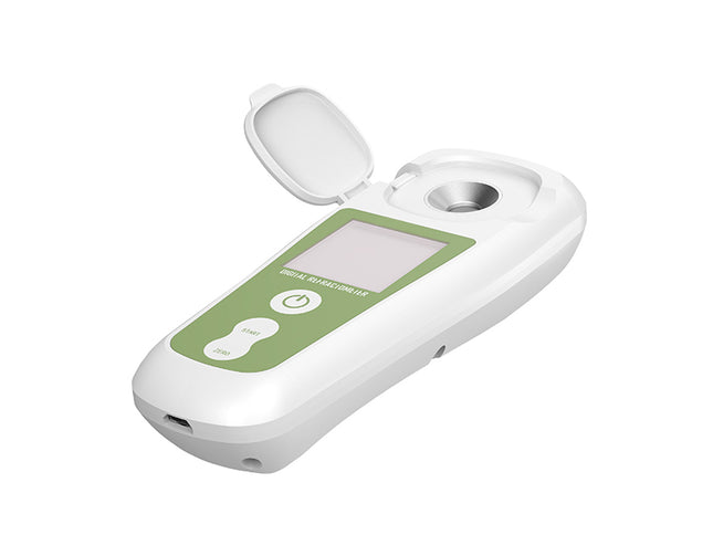 White and green electronic device on a white background