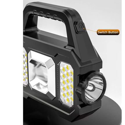 Black portable work light with switch button on a white background