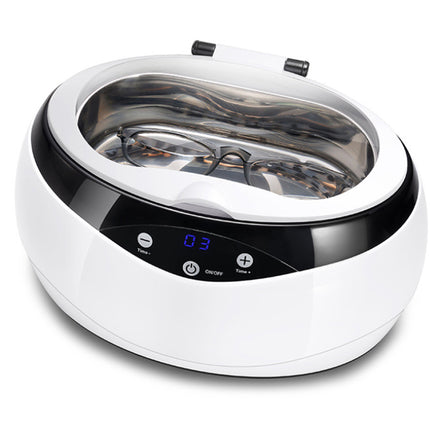 White ultrasonic cleaner with digital display on a white background