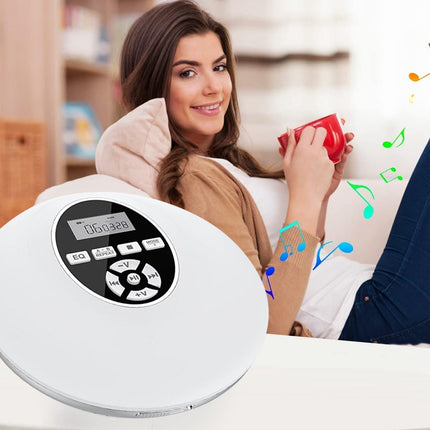 A white round electronic device with a black control panel is shown in the foreground, while a woman relaxes in a living room setting holding a red mug. Colorful floating music notes appear around her, suggesting audio or music functionality.