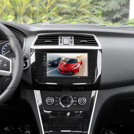 Car dashboard with a touchscreen display showing images of cars.