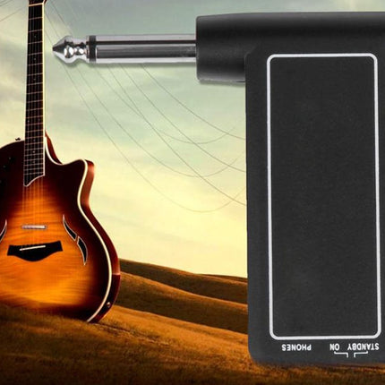 Guitar effects pedal with guitar and landscape background