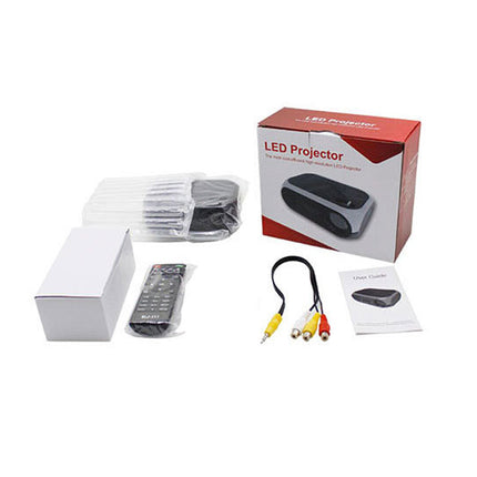 LED projector with accessories on a white background
